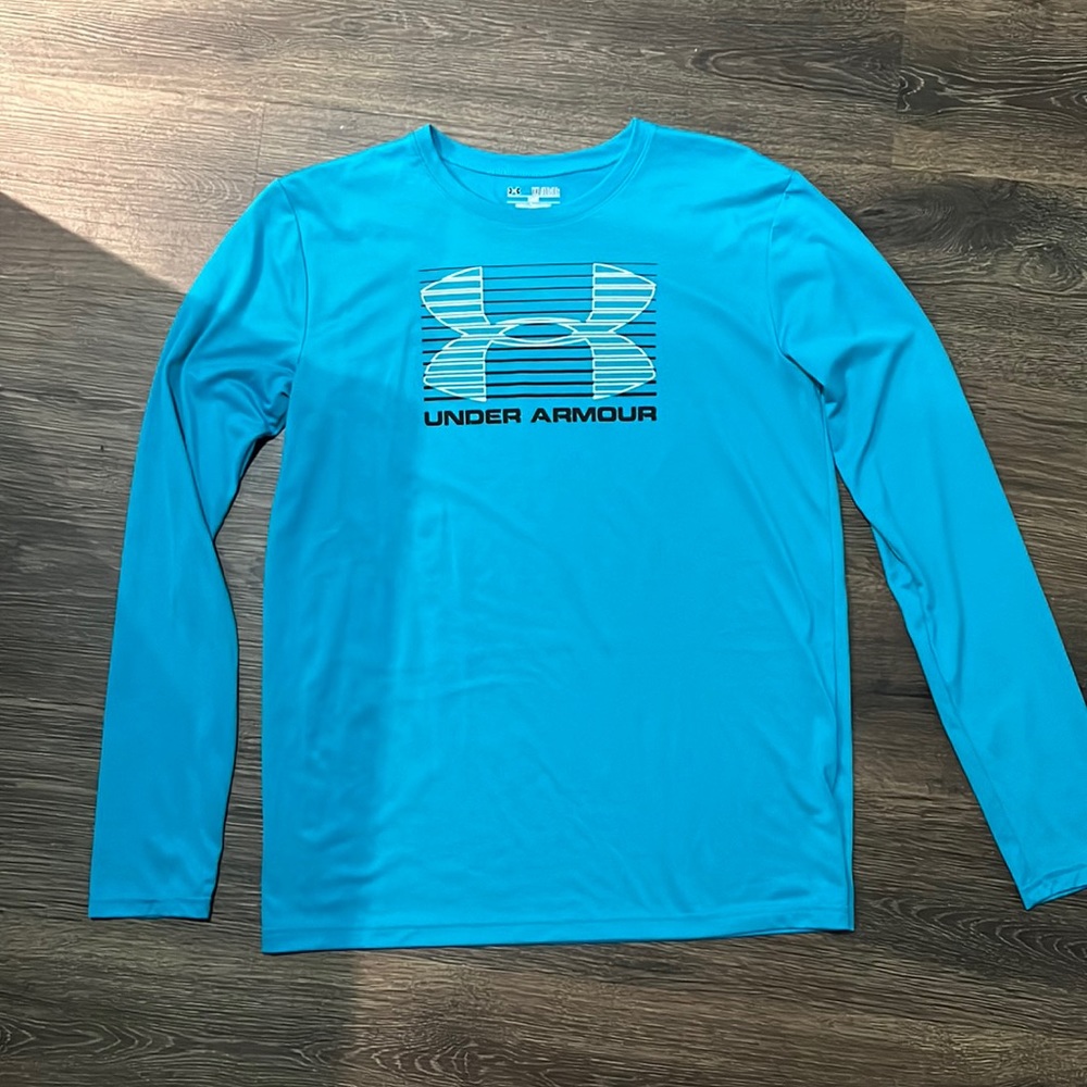 Teal blue UA Youth XL long sleeve shirt. New without tags, never worn.